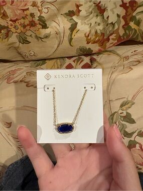 Kendra Scott Gold Necklace with Deep Blue Stone